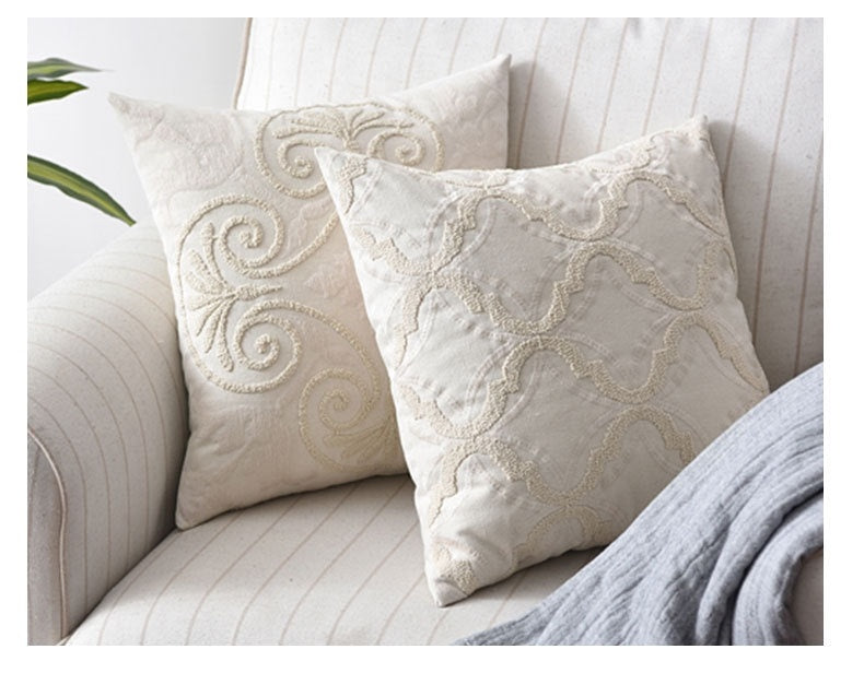 Coussin de tête de lit brodé en coton et lin tissé.