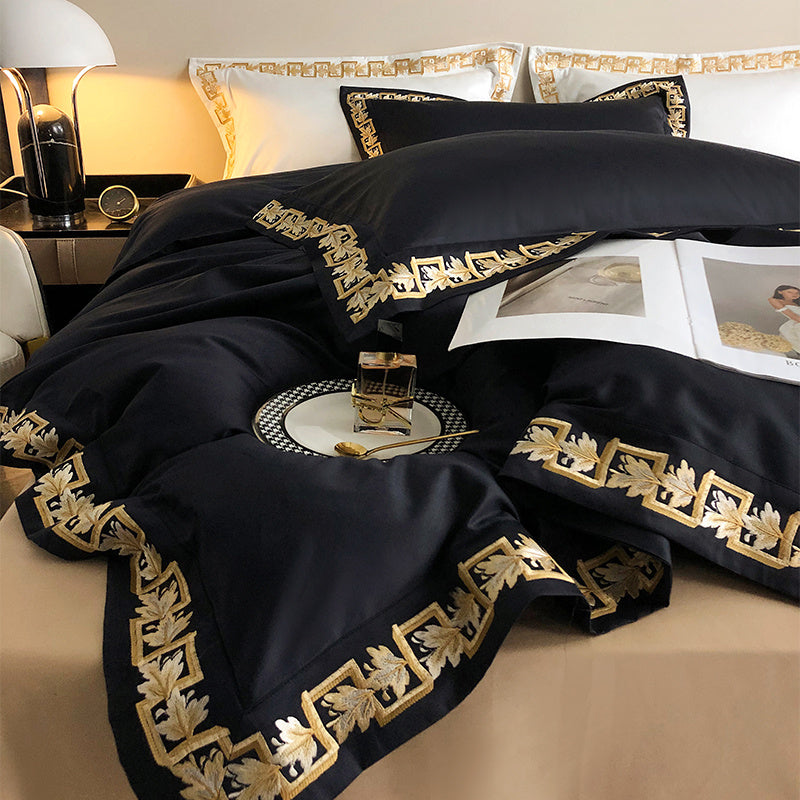 Parure de lit brodé en coton, 4 pièces.