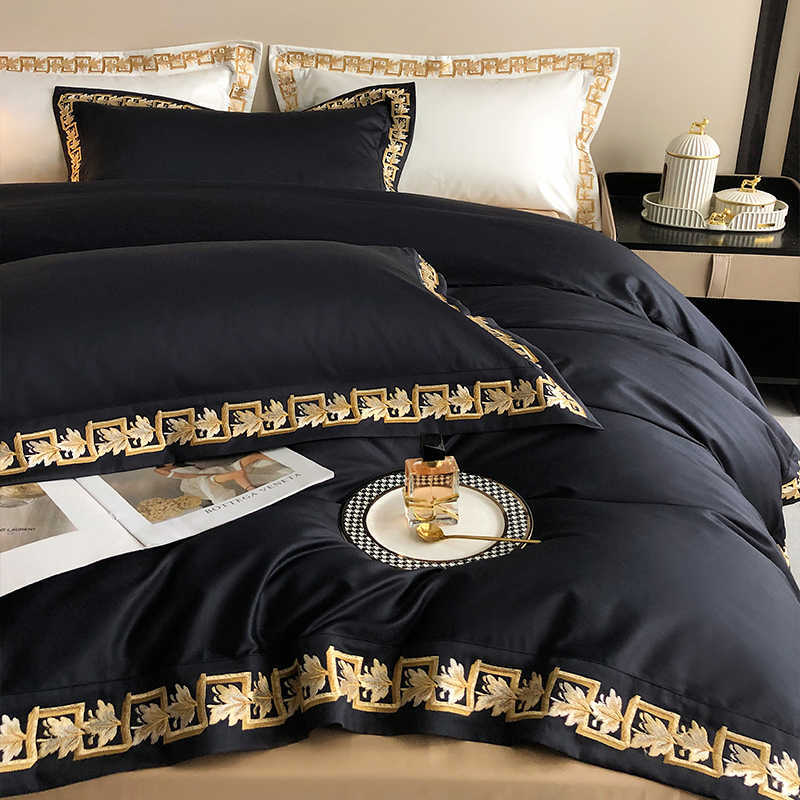 Parure de lit brodé en coton, 4 pièces.