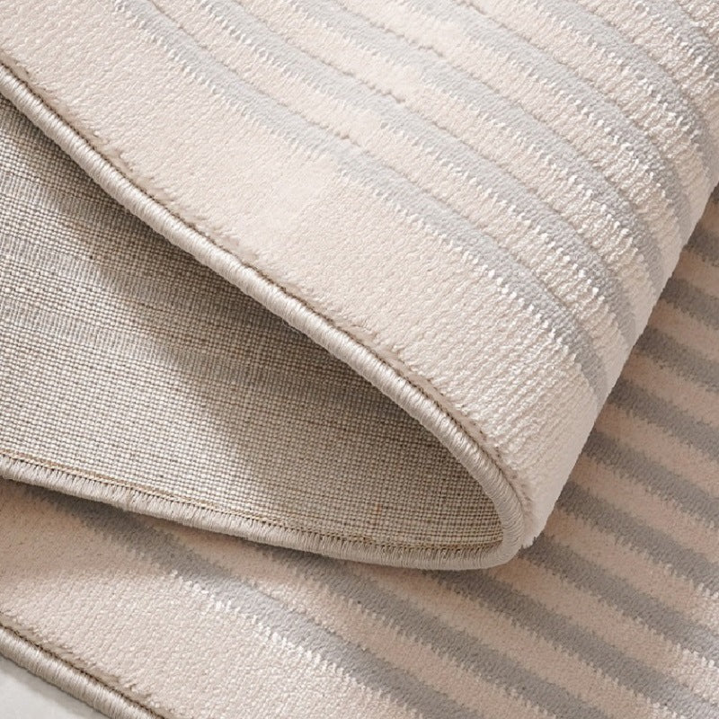 Tapis de sol blanc minimaliste pour salon, matière fibres de polyester luxe léger.
