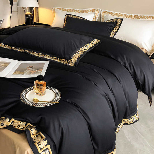 Parure de lit brodé en coton, 4 pièces.