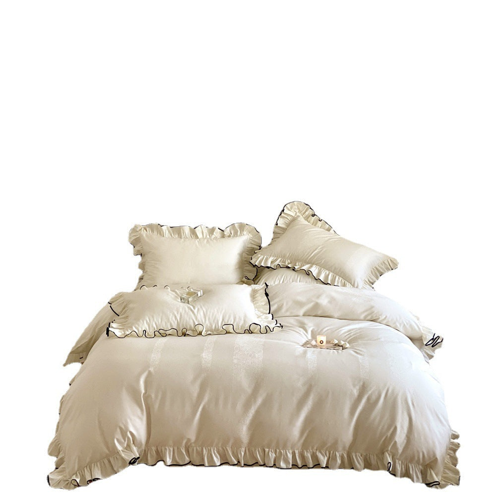 Parure de lit en coton à longues fibres français.