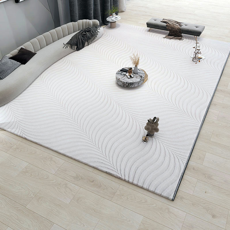 Tapis de sol blanc minimaliste pour salon, matière fibres de polyester luxe léger.