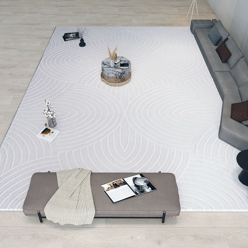 Tapis de sol blanc minimaliste pour salon, matière fibres de polyester luxe léger.