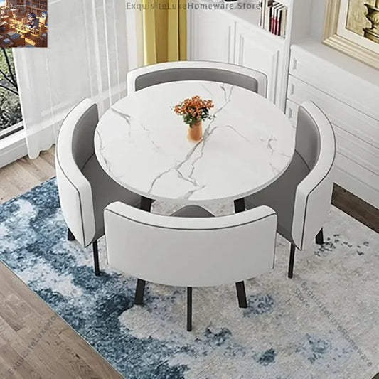 Table ronde 70 cm marbrée avec 4 chaises.