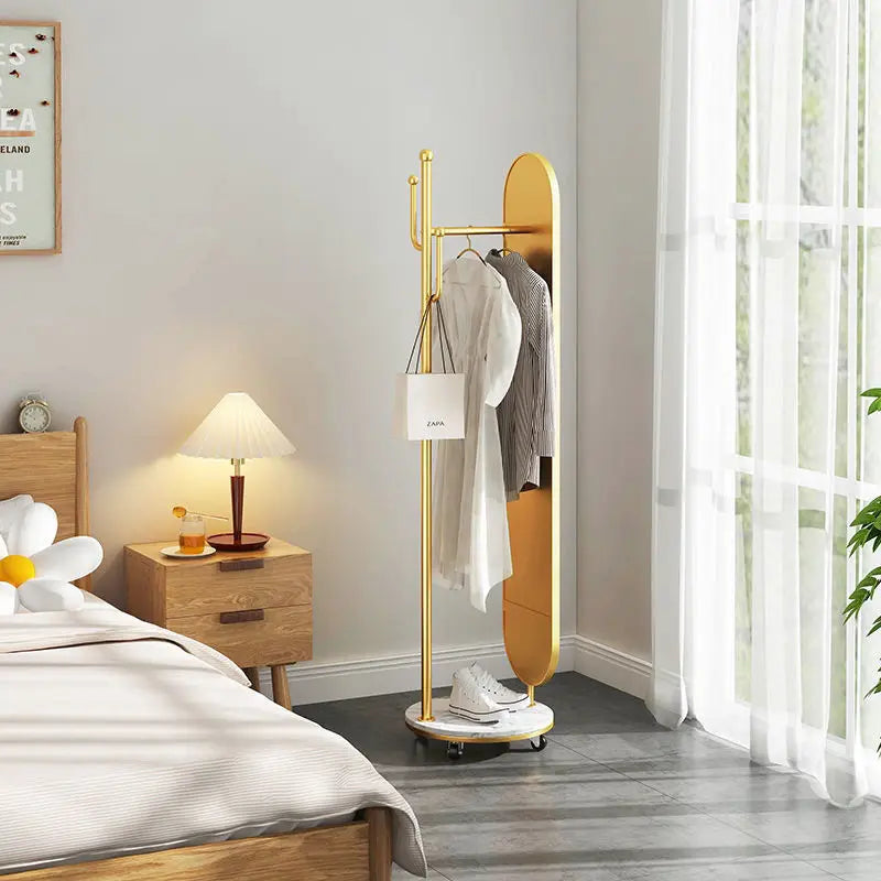 Porte vêtements avec miroir sur support à roulettes, de dimensions 180x45cm.