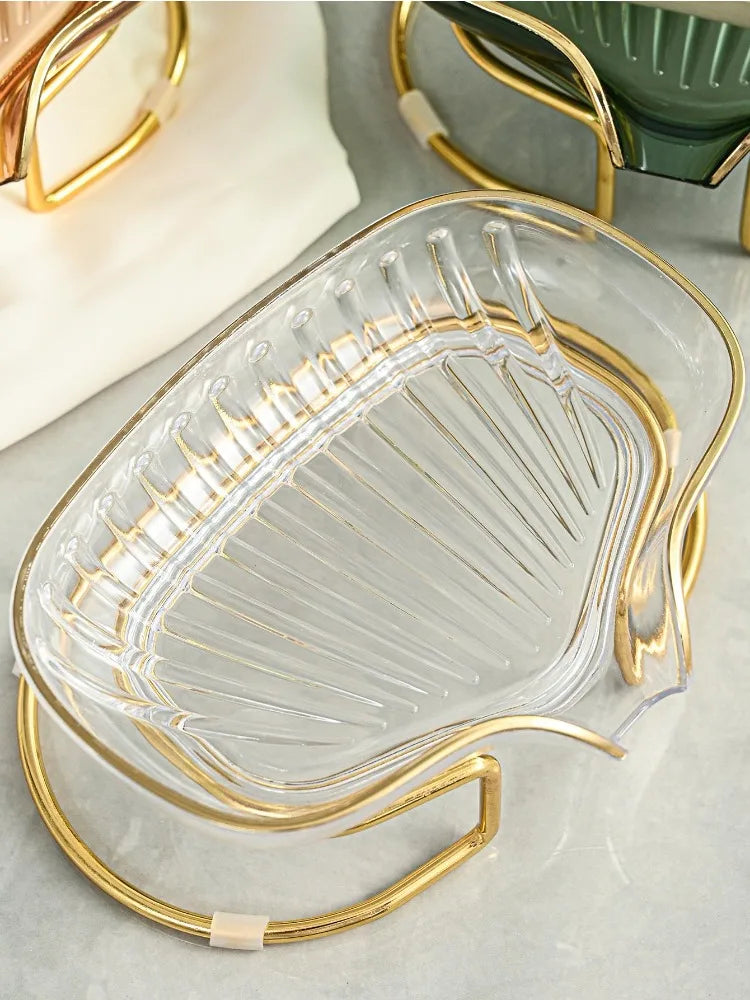 Porte savon original avec support en doré.