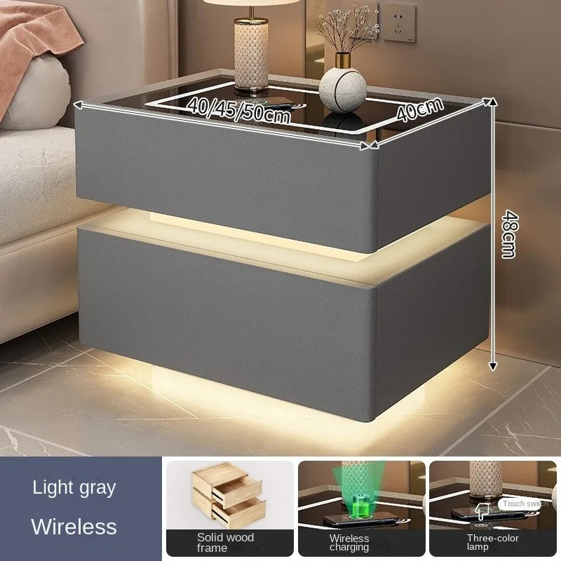 Smart bedside table with LED and wireless phone charging port.