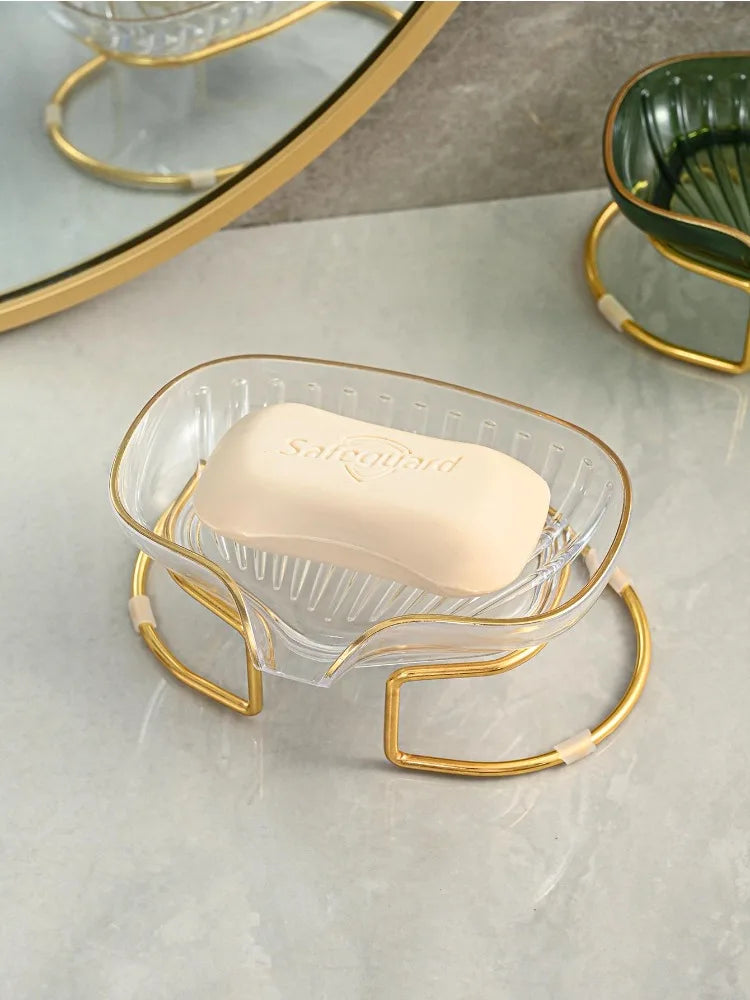 Porte savon original avec support en doré.