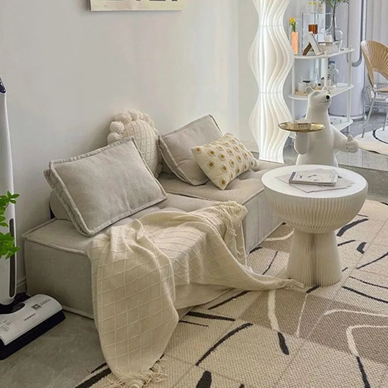 Modern white sofa in a minimalist style.