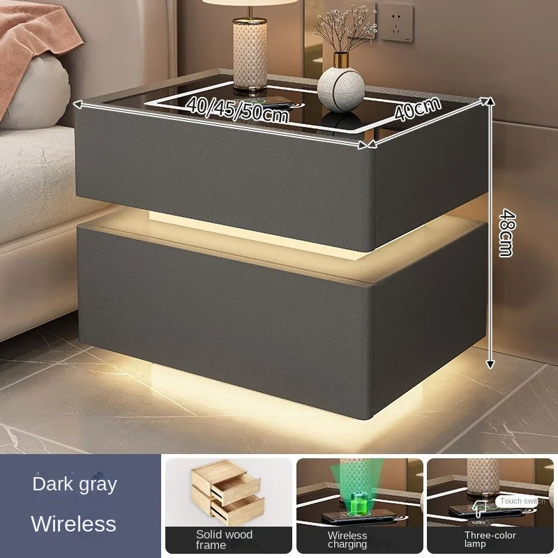 Smart bedside table with LED and wireless phone charging port.