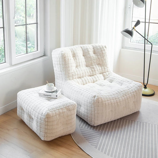 Sofa blanc confortable et son repose pied/table