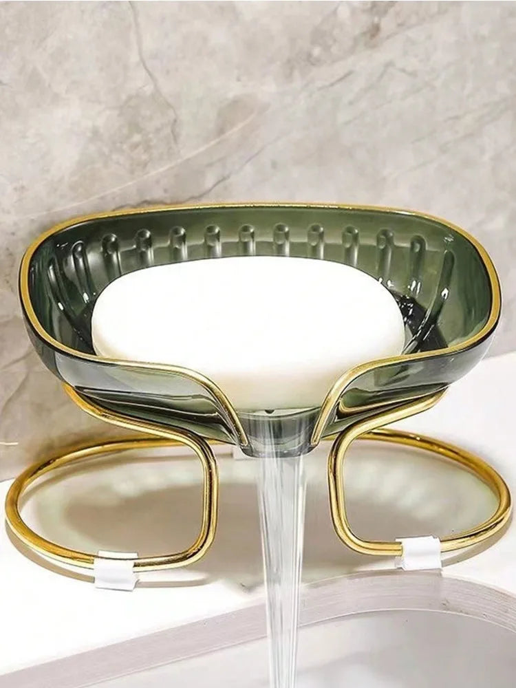 Porte savon original avec support en doré.