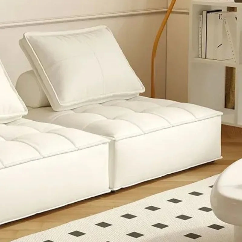 Modern white sofa in a minimalist style.