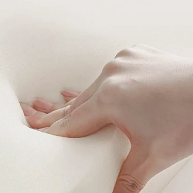 Modern white sofa in a minimalist style.