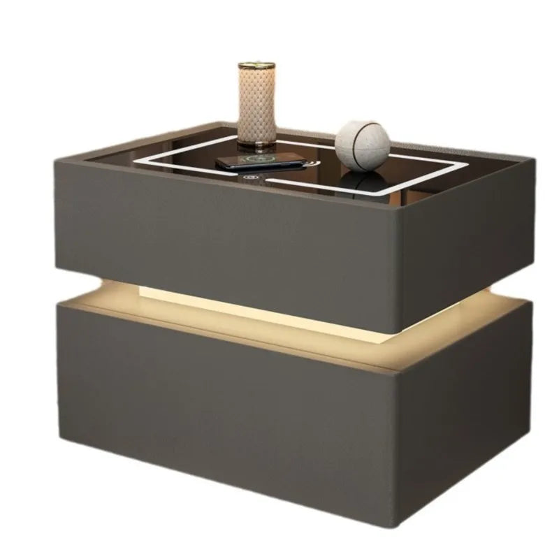 Smart bedside table with LED and wireless phone charging port.