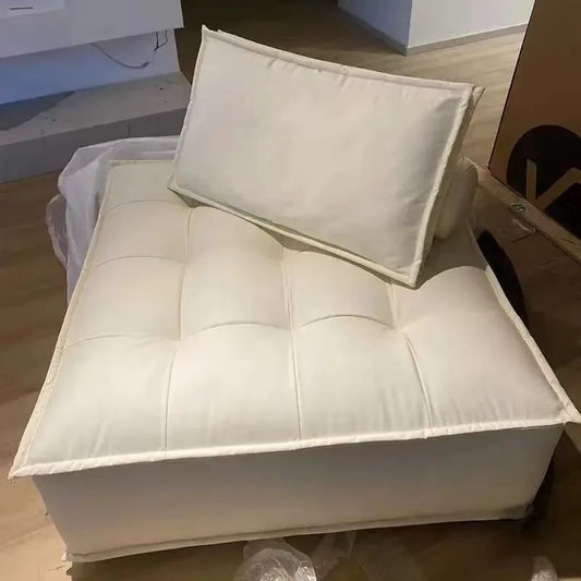 Sofa blanc moderne de style minimaliste.