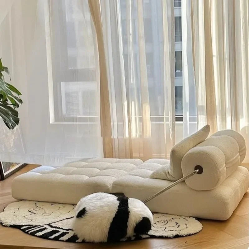 Minimalist white sofa in Nordic style, extendable for added comfort.