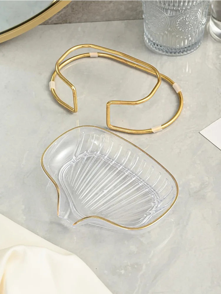 Porte savon original avec support en doré.