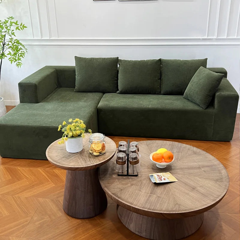 Canapé modulable 4 places vert kaki, 240cm avec coussins assortis.