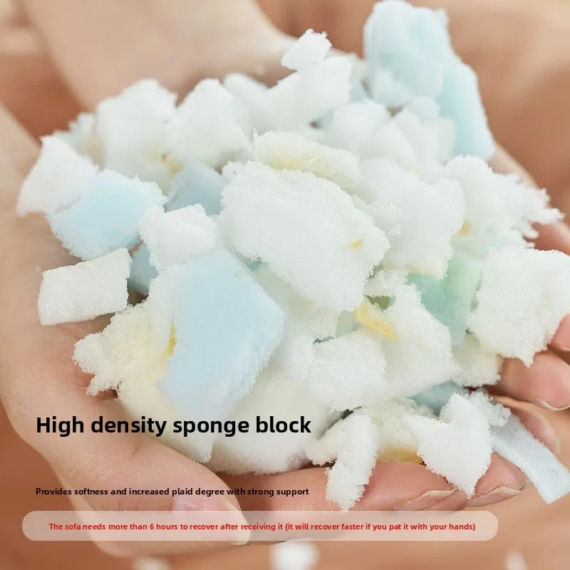 Sofa blanc confortable et son repose pied/table