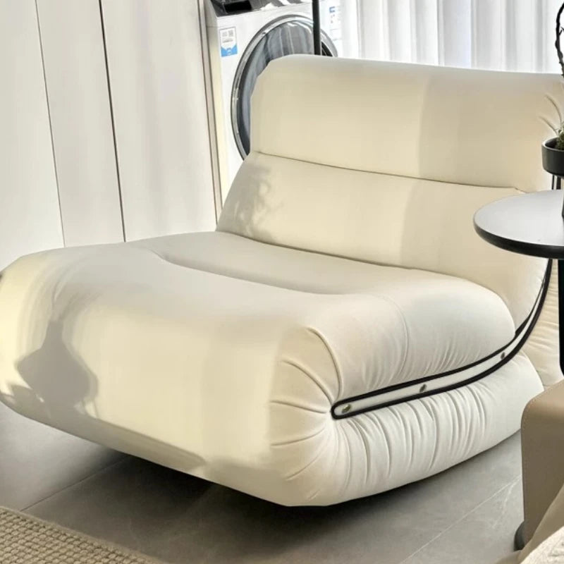 White leather sofa/armchair.