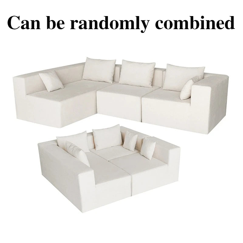 Canapé 4 places modulable blanc, 280cm. Assorti de ses coussins.