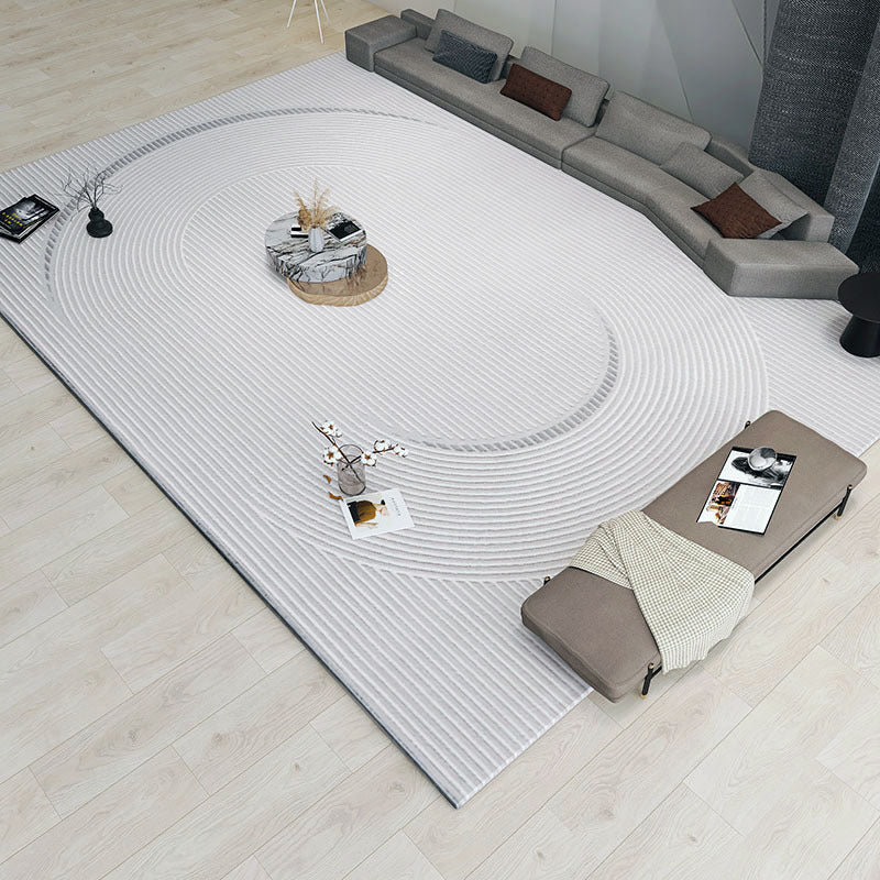 Tapis de sol blanc minimaliste pour salon, matière fibres de polyester luxe léger.