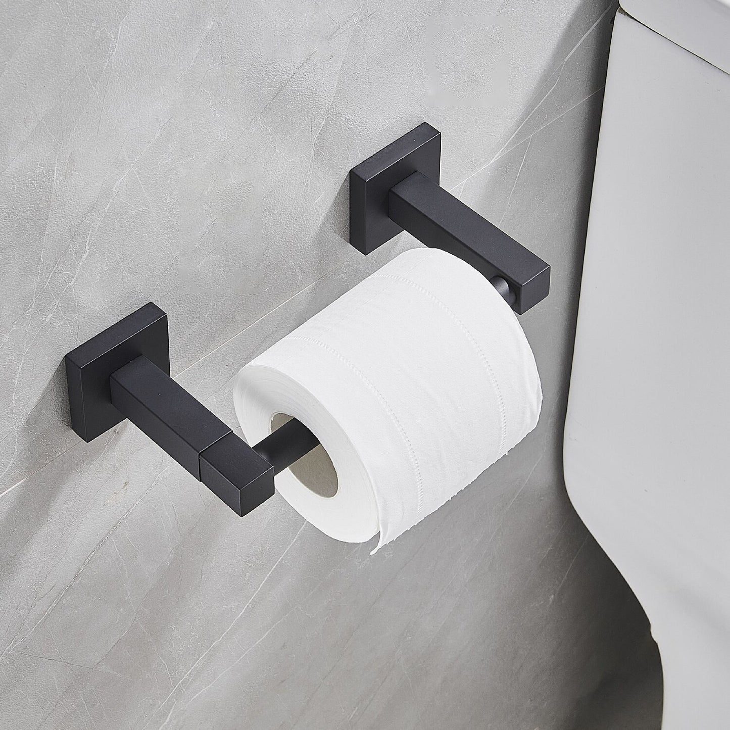 Porte-papier hygiénique mural en acier inoxydable pour toilettes.