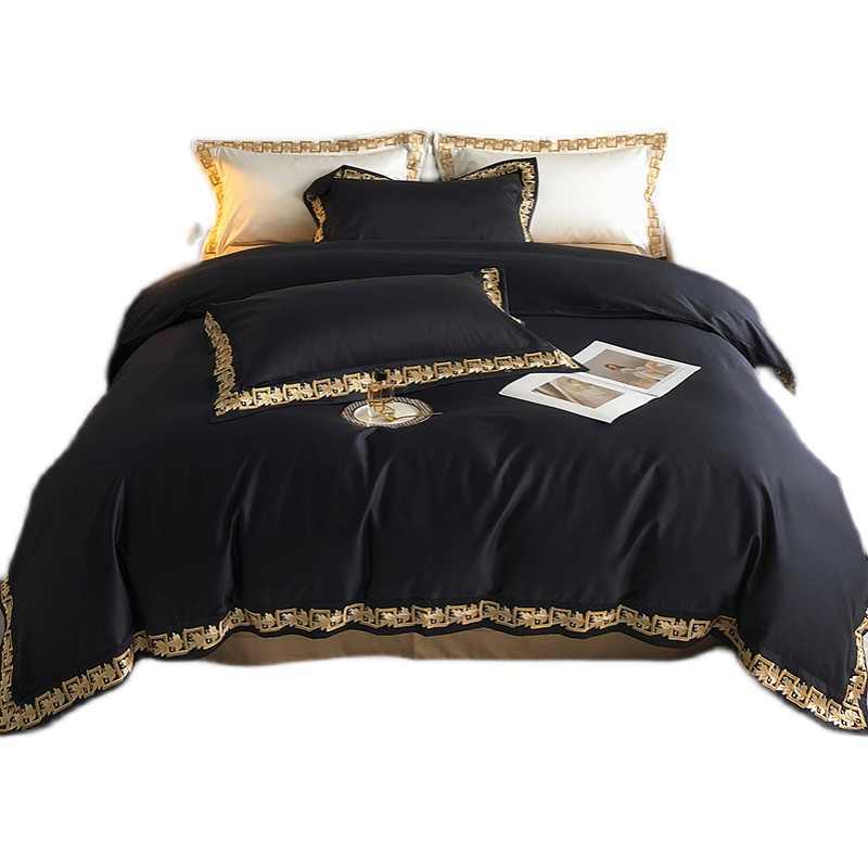 Parure de lit brodé en coton, 4 pièces.