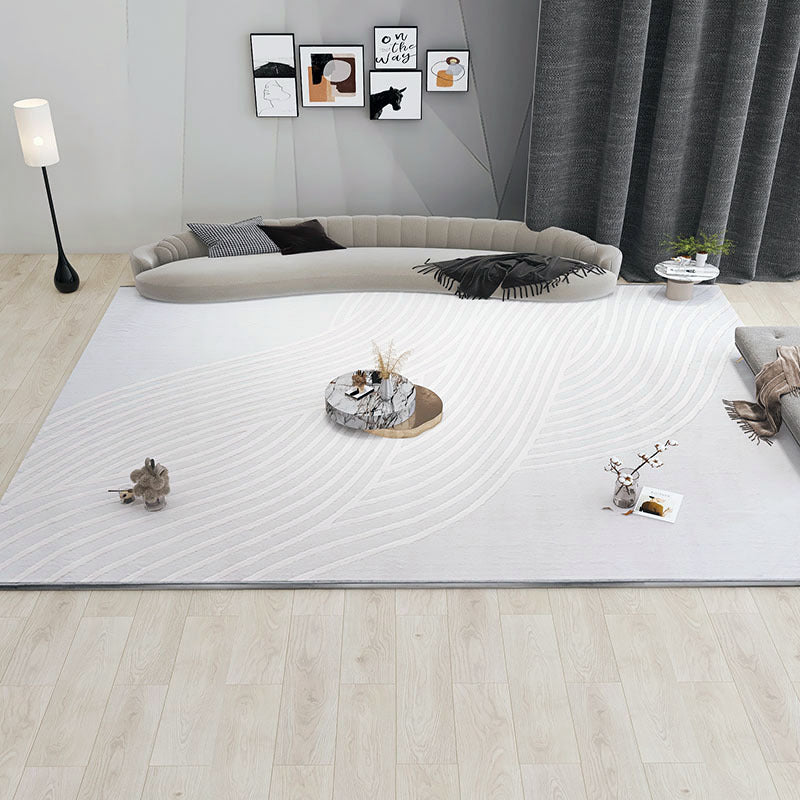 Tapis de sol blanc minimaliste pour salon, matière fibres de polyester luxe léger.